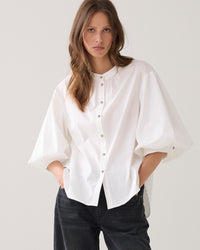 Blouse with diamond buttons
