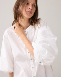 Blouse with diamond buttons