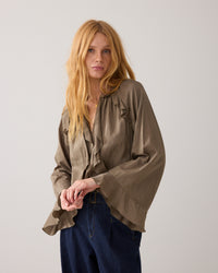 Shiny Top with Ruffles