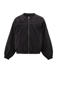 A women's lightweight bomber jacket in a soft beige color with a relaxed, slightly oversized fit. It features a round neckline, a full-length front zipper, and gathered detailing along the chest for a subtle textured effect. The long sleeves are voluminous and taper into elasticated cuffs, while the hem also has an elastic finish for a comfortable and slightly cropped silhouette.
