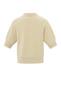 his is a women's short-sleeve zip-up cardigan in a soft, warm beige color. It is made from a finely knitted fabric with a smooth texture and a structured yet comfortable fit. The cardigan features a classic folded collar that sits neatly around the neckline, leading down to a silver-toned full-length zipper at the front, allowing it to be worn open or closed.

The sleeves are elbow-length with a slightly loose fit, finished with ribbed cuffs for a subtle contrast in texture. The hem is also ribbed, giving t